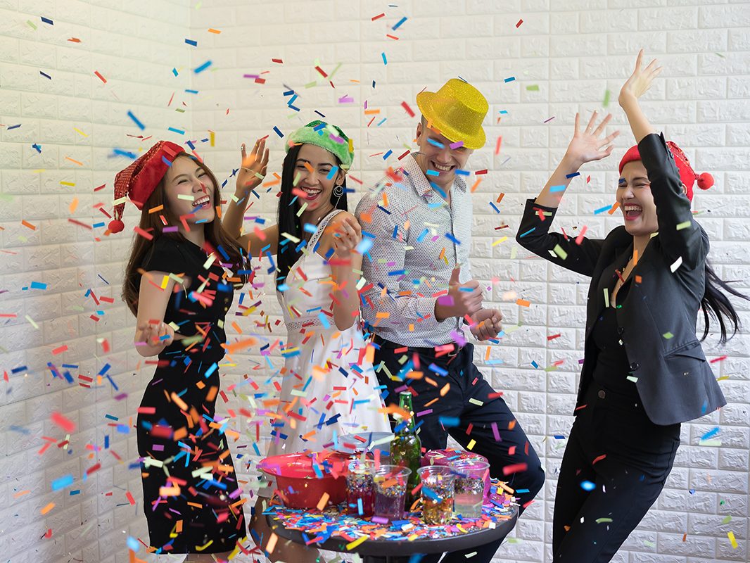 Happy business group people in santa hat having fun for celebrit